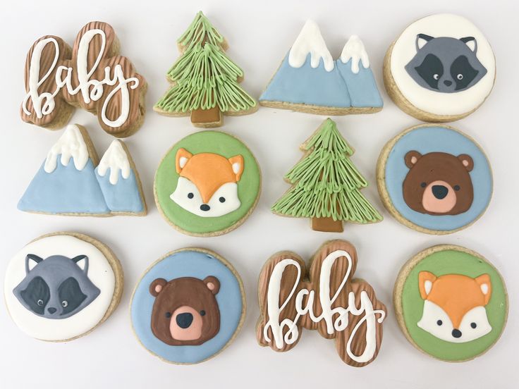 baby shower cookies decorated like animals and trees