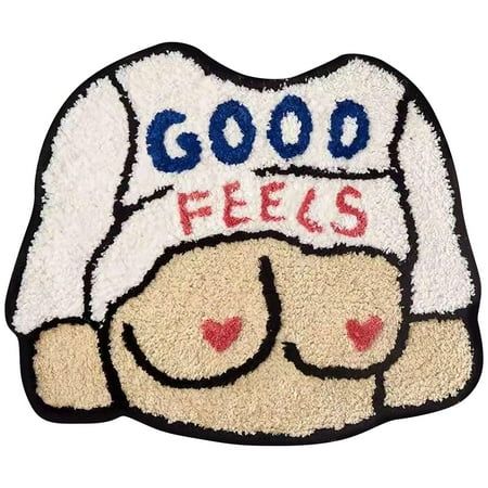 a door mat with the words good feels on it and a teddy bear wearing a hat