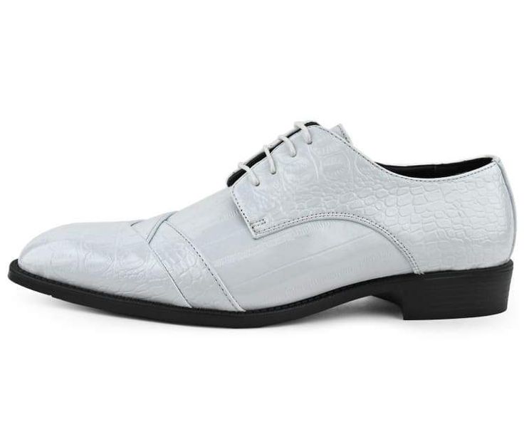 Featuring a fusion of classic design elements and modern, eye-catching accents, This men's Oxford dress shoe by Bolano is a must-have accessory for the dapper gentlemen. You'll always be ready for red carpet season when you finish your formalwear ensemble with distinctive details. This lace-up features a beautiful croco folded print cap toe; the crisscross design on the tip make these shoes truly unique and truly exotic so you can stand out in the crowd. Express your personal style with a select Tuxedo Shoes For Men, White Dress Shoes Men, Tuxedo Shoes, White Dress Shoes, Gentleman Shoes, Dapper Gentleman, Wedding Dress Shoes, Mens Formal, Dress Shoe