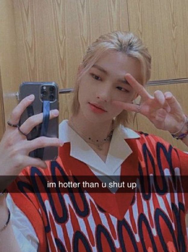 a person taking a selfie in front of a mirror with the caption i'm hotter than u shut up