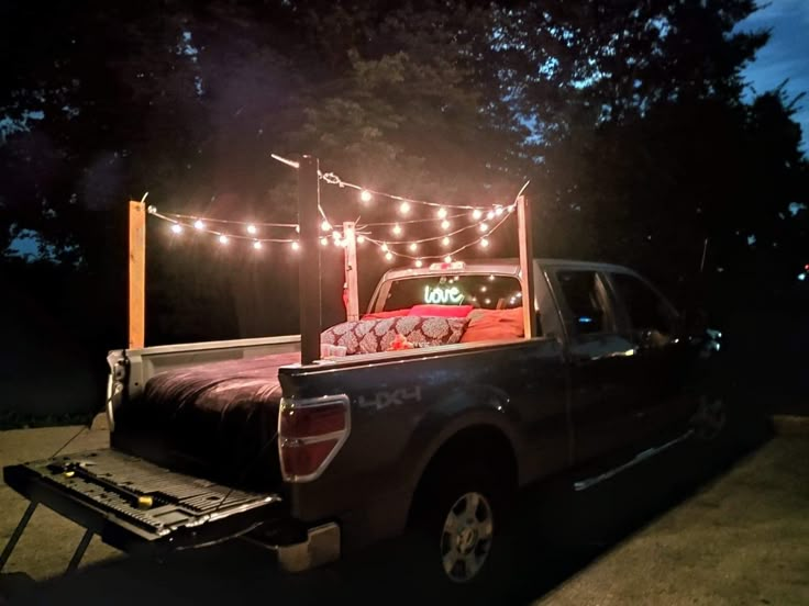 a truck with lights on it's bed in the back