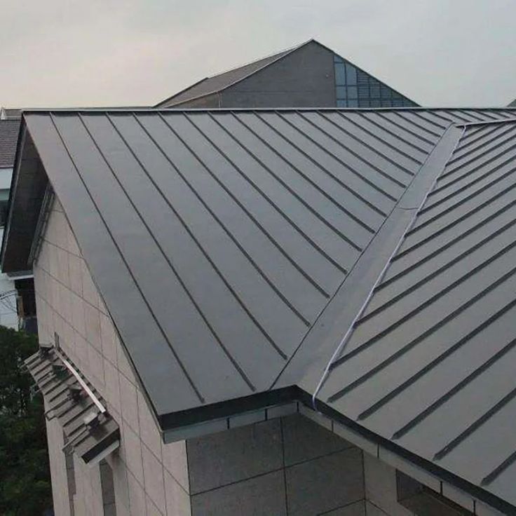 the roof of a building with metal shingles