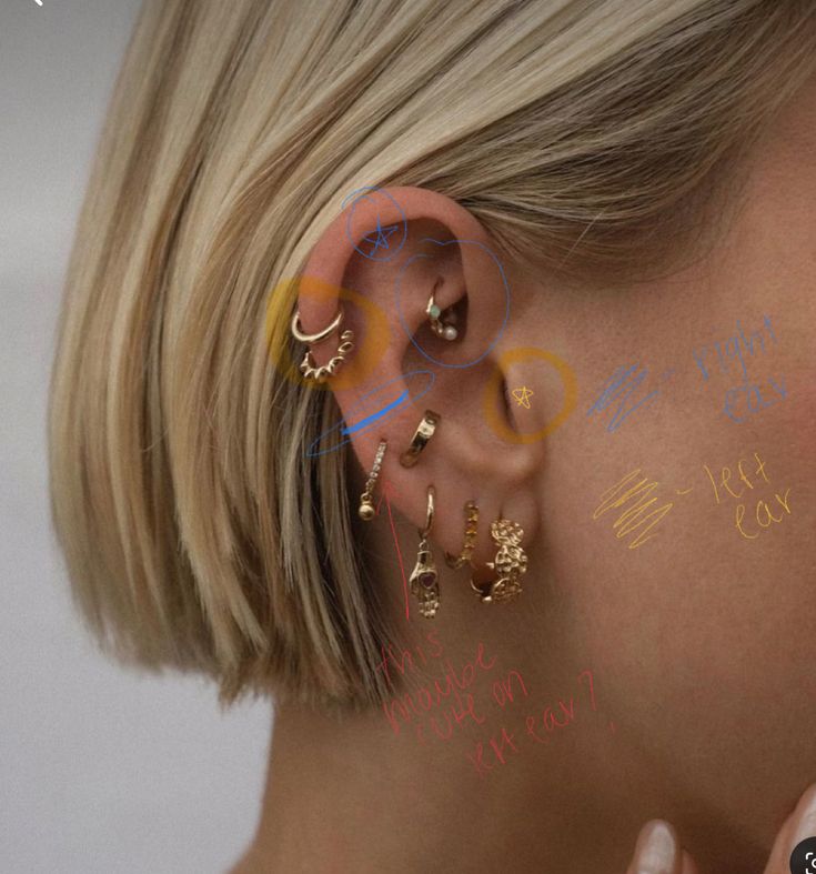 a blonde woman wearing gold ear piercings