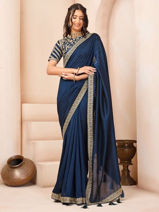 Blue and gold-toned sareeSolid saree with embroidered borderThe saree comes with an unstitched blouse pieceThe blouse worn by the model might be for modelling purpose only. Check the image of the blouse piece to understand how the actual blouse piece looks like. Cinderella Fashion, Dress Saree, Edgy Dress, Saree Sale, Traditional Blouse Designs, Saree Style, Trendy Dress Outfits, Women Fashion Edgy, Womens Fashion Casual Summer