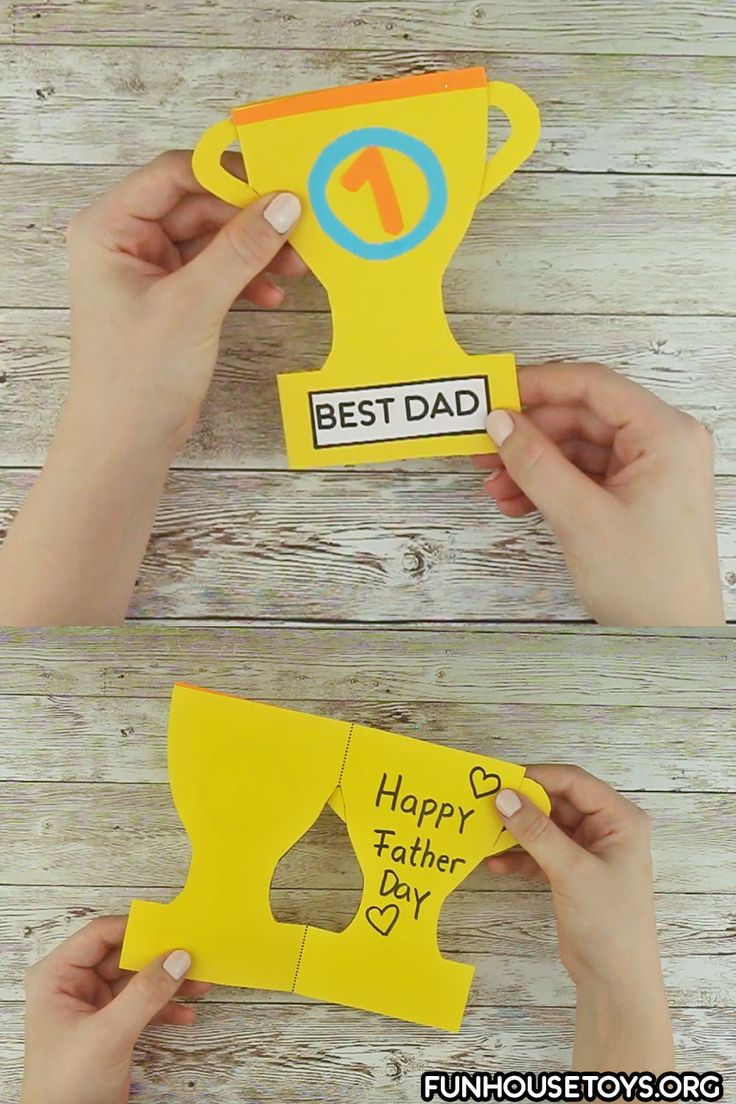 someone is making a father's day card out of construction paper and cut it out