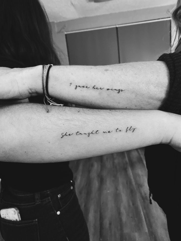 two people with arm tattoos that say i love you always