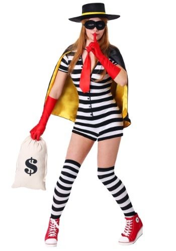 a woman dressed as a mime holding a bag