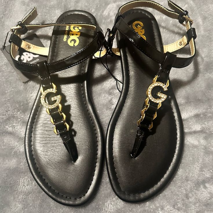 Nwt! Super Cute Sandals! Black Sandals With Rhinestones & Gold Accents. Lightly Padded With Adjustable Buckle Ankle Strap. Heel Is 1/4” Size 10m Black And Gold Sandals, Gold Sandals, Cute Sandals, Sandals Black, Thong Sandals, Gold Accents, Black Sandals, Women's Shoes Sandals, Ankle Strap