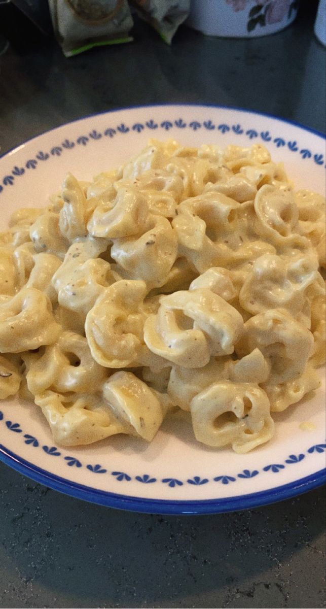 a white plate topped with macaroni and cheese