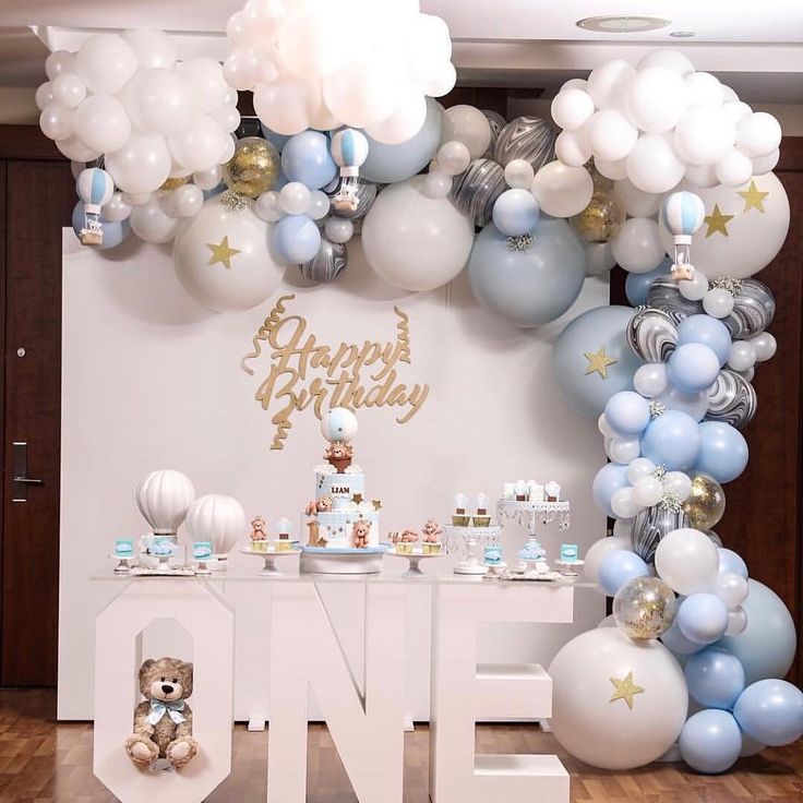 a birthday party with balloons and decorations