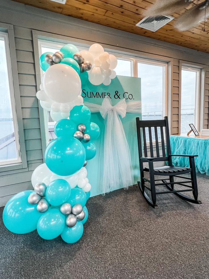 balloons and streamers are on display in the room