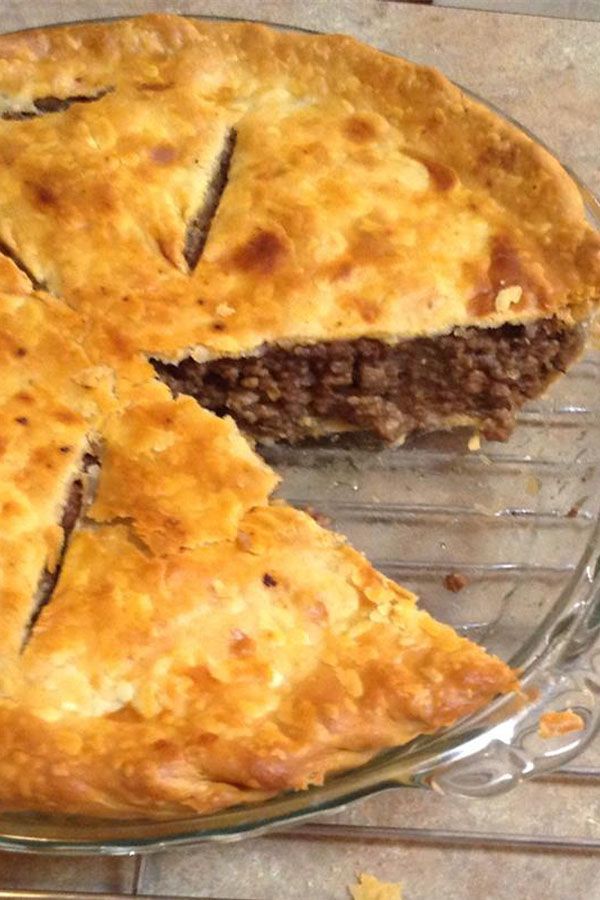 a pie sitting on top of a glass plate