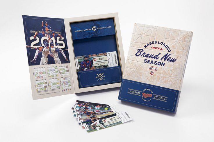 the baseball card box is open to show it's official team uniform and memorabilia