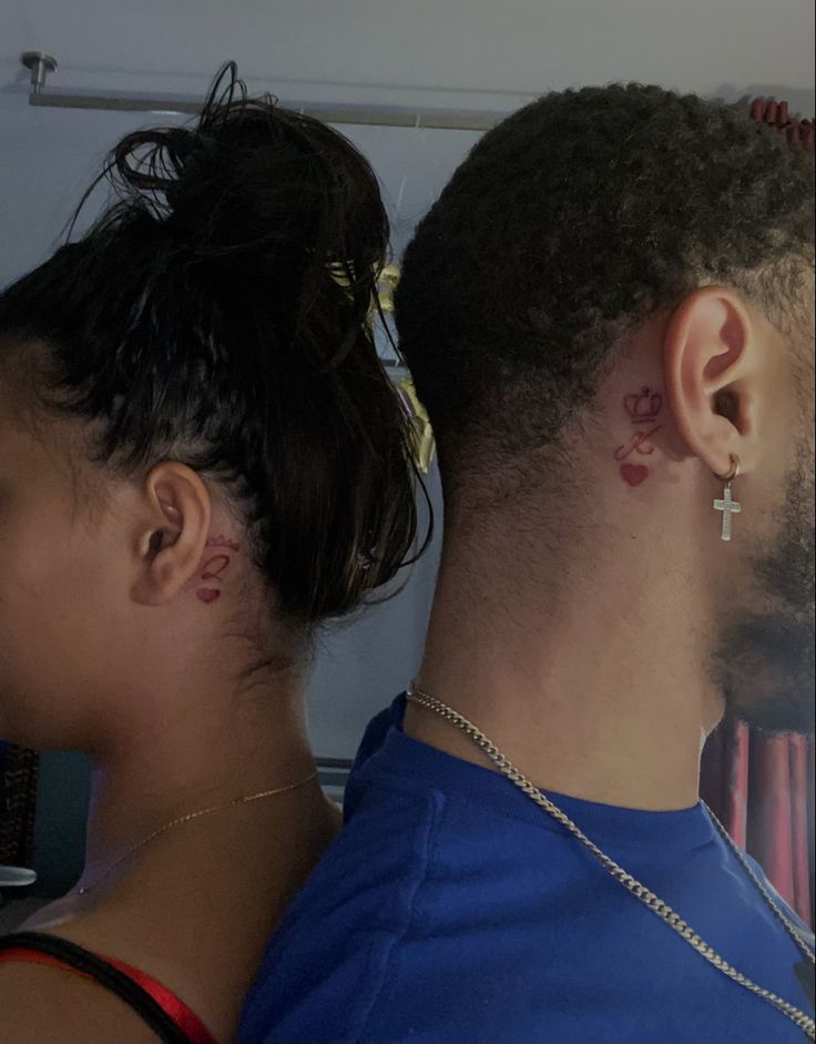 two people with ear piercings on their ears