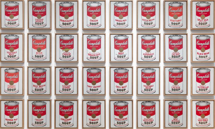 many cans of campbell's soup are stacked on top of each other in rows