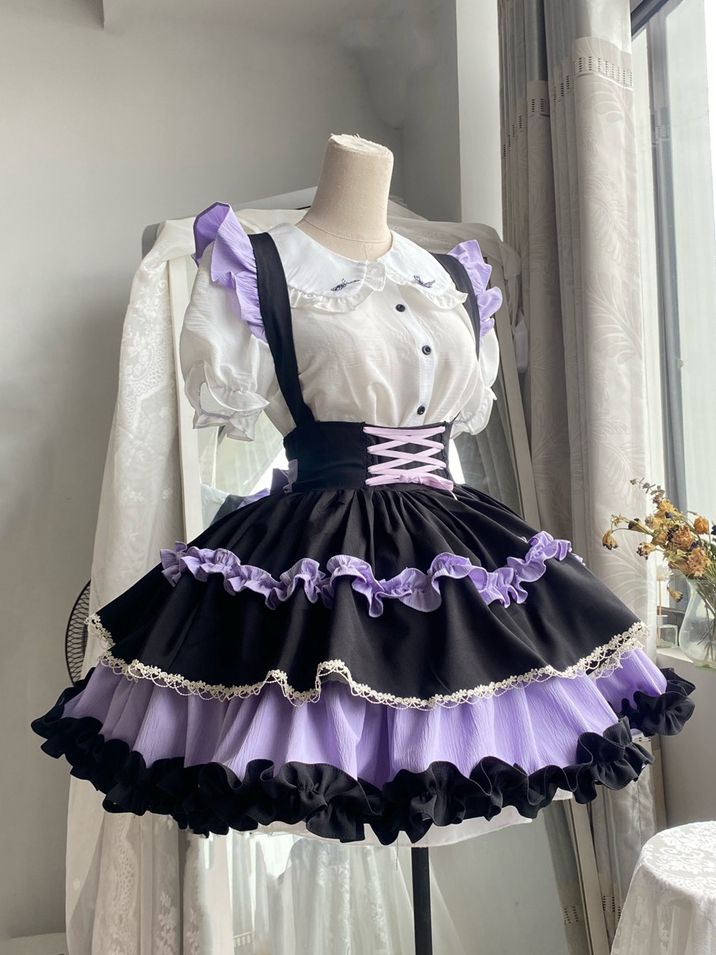 This stunning Lolita skirt features a charming black and purple color scheme, accentuated by a lace-up front and a high waist design for a flattering fit. The detachable straps add a versatile touch, allowing you to customize your look. Embrace the sweet and elegant Lolita style with this beautiful skirt that is perfect for any occasion.   	 		 			Size 			S 			M 			L 		 		 			Waist 			58-82 			64-88 			72-94 		 		 			Full Length 			43 			44 			45 		 		 			Hem Circumference 			426 			426 			426 Purple Clown Outfit, Purple Maid Dress, Pretty Dresses Purple, Purple Idol Outfits, Black Tiered Skirt For Cosplay, Black Mini Dress With Ruffled Skirt, Black Costume Skirt With Attached Cancan, Black Ruffled Skirt For Cosplay, Black Skirt With Attached Cancan For Costume