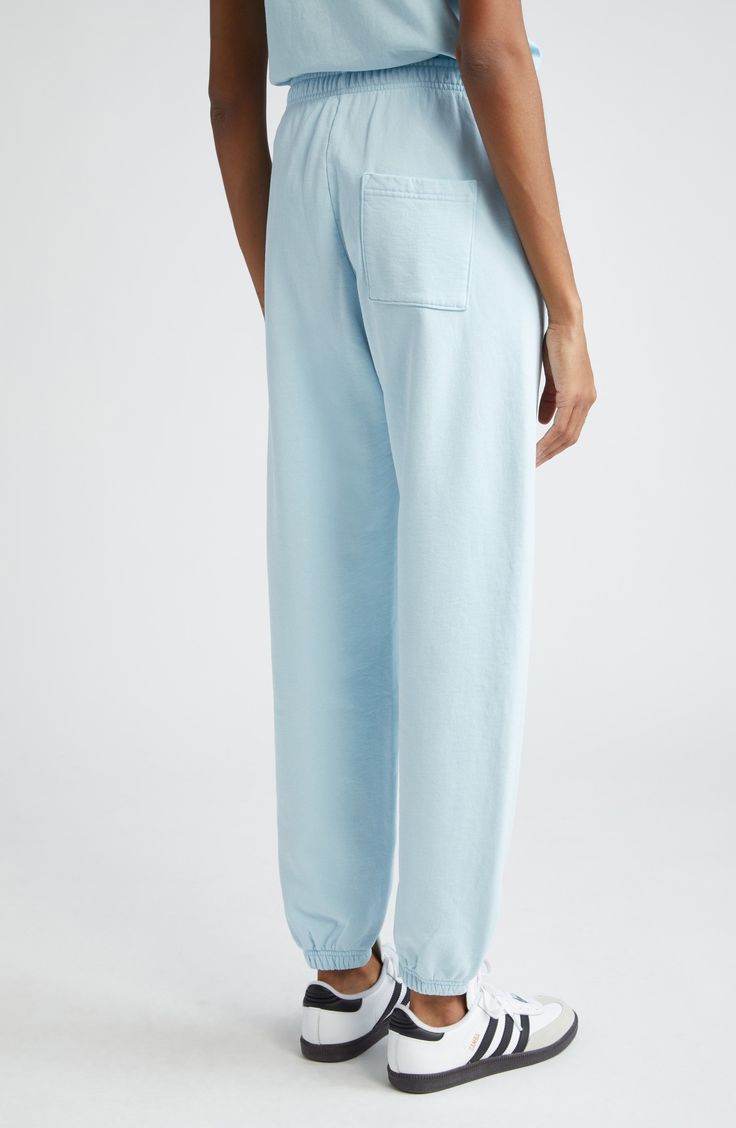 A sky-blue hue adds to the relaxed vibe of these all-cotton joggers you'll wear all weekend. 28 1/2" inseam; 10" leg opening; 11 1/2" front rise; 16 1/2" back rise (size Medium) Elastic waist Front slant pockets; back patch pocket 100% cotton Machine wash, tumble dry Made in the USA Asian & Pacific Islander Owned/Founded Comfortable Blue Sweats With Ribbed Cuffs, Comfortable Blue Bottoms With Ribbed Cuffs, Blue Cotton Sweatpants With Ribbed Cuffs, Blue Sweats With Elastic Waistband For Leisure, Blue Sweats With Elastic Waistband, Comfy Blue Sweats With Ribbed Cuffs, Blue Relaxed Fit Bottoms With Ribbed Cuffs, Blue Bottoms With Ribbed Cuffs And Relaxed Fit, Blue Leisure Bottoms With Ribbed Waistband