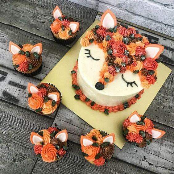 there are cupcakes that have been made to look like foxes