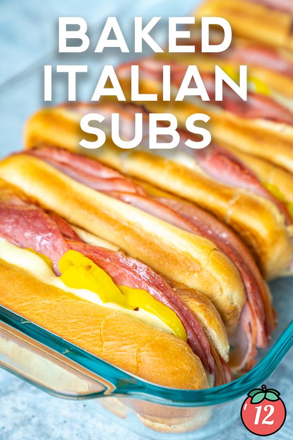 baked italian subs in glass baking dish with text overlay