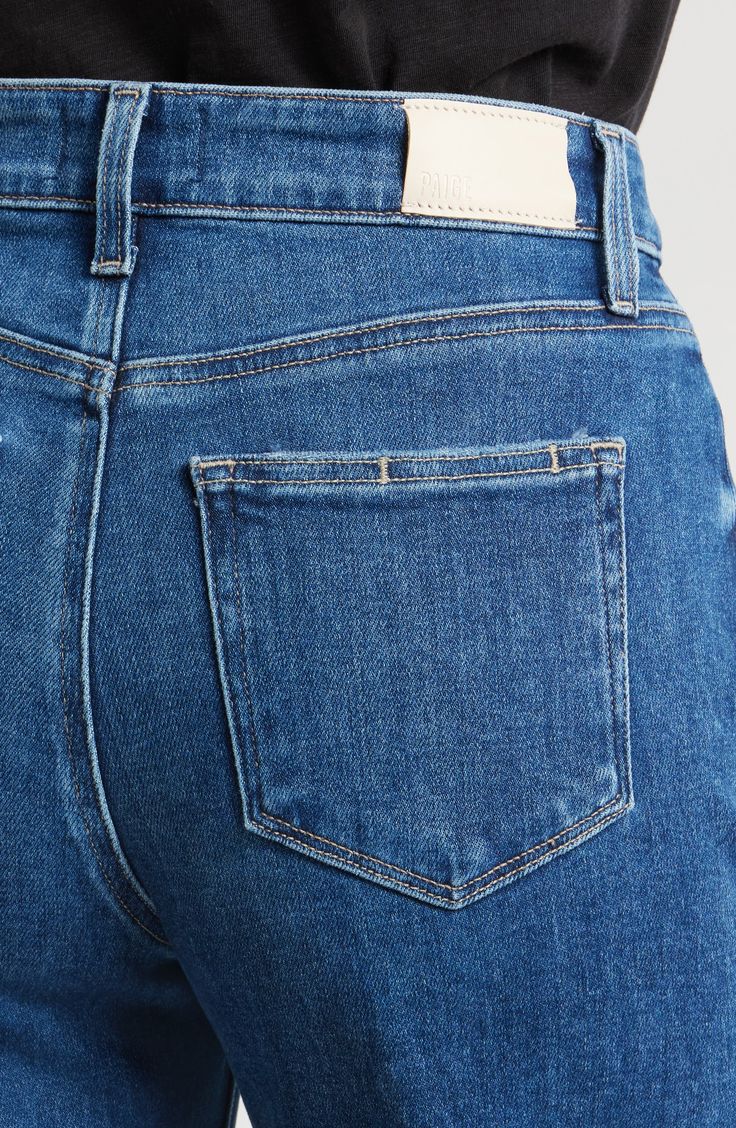 The faded wash and roughed-up edges of these wide-leg jeans offer an authentic rigid look, but the denim is surprisingly soft and stretchy with great recovery. 26" inseam; 22 1/2" leg opening; 12" front rise; 15" back rise (size 29) Zip fly with button closure Five-pocket style 93% cotton, 5% polyester, 2% spandex Machine wash, line dry Imported Everyday Dark Wash Flare Jeans With Frayed Hem, Classic Denim Flare Jeans With Frayed Hem, Classic Flare Jeans In Denim Blue With Frayed Hem, Faded Flare Jeans With Frayed Hem In Rigid Denim, Classic Denim Blue Flare Jeans With Frayed Hem, Classic Cropped Flare Jeans With Frayed Hem, Faded Flare Jeans With Frayed Hem, Classic Flare Jeans With Frayed Hem For Everyday, Everyday Medium Wash Cutoff Flare Jeans