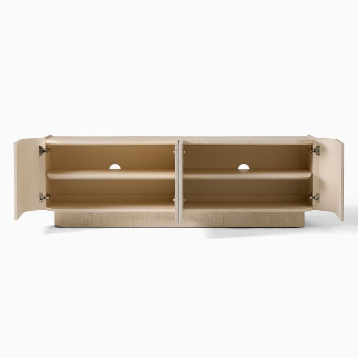 the sideboard is empty and has two shelves on one side, with no doors