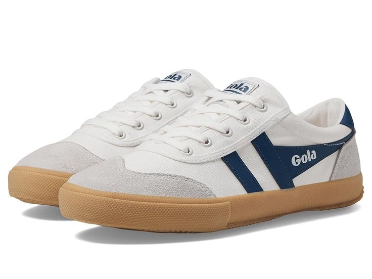 Gola Badminton - Men's Shoes : Off-White/Baltic/Gum : A casual weekend out calls for this stylish laid-back sneaker. Durable canvas upper with leather and suede overlays. Lace-up closure for a secure fit. Logo tag on tongue. Breathable cotton linings. Textile-lined, cushioned footbed. Durable rubber outsole. Imported. Measurements: Weight: 15 oz Product measurements were taken using size 11, width D - Medium. Please note that measurements may vary by size. Urban Style Canvas Shoes For Sports, Low-top Canvas Shoes For Sports, Sporty Lace-up Canvas Shoes With Gum Sole, Outdoor Lace-up Canvas Shoes With Vulcanized Sole, Urban Cotton Sneakers With Gum Sole, Casual Sports Canvas Shoes With Rubber Sole, Casual Canvas Shoes With Rubber Sole For Sports, Casual Sneakers With Gum Sole For Sports, Canvas Slip-on Sneakers With Gum Sole And Round Toe