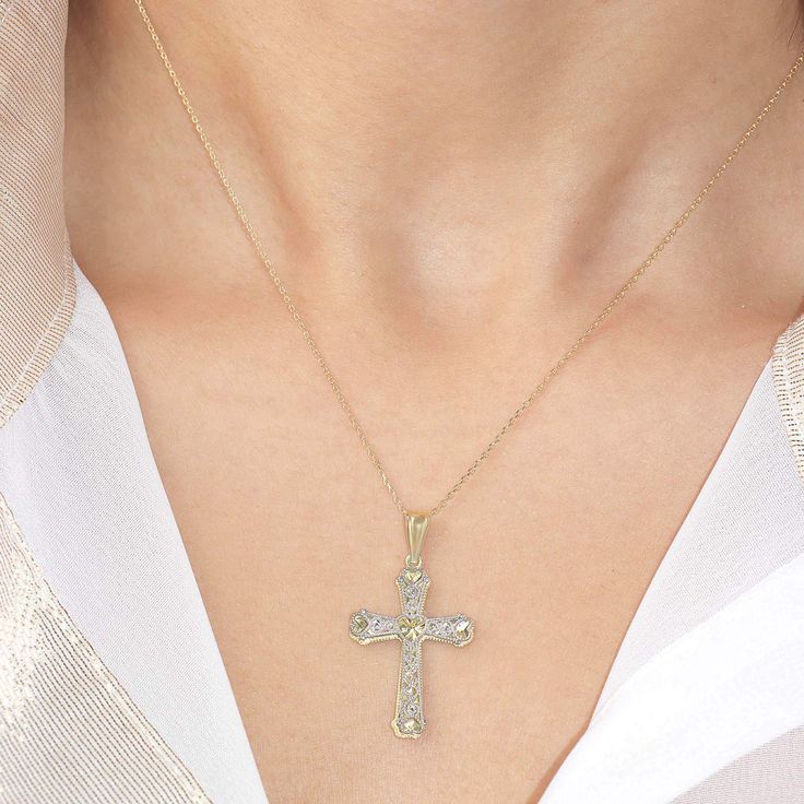 Stunning Fine Jewelry Piece! The exquisite details of this cross pendant is one-of-a-kind and is perfect for all occasions. From its filigree touches to its diamond-cut heart accents this pendant is absolutely special. Made in 18K gold plated over sterling silver. -Care Instructions: Avoid exposure to harsh chemicals such as perfumes or lotions and household cleaners. These can tarnish the material plating and affect the overall appearance of your jewelry. If your jewelry needs cleaning: use a s Gold Cross Pendant Necklace With Diamond Accents, Diamond Cut Crucifix Cross Necklace For Anniversary, Gold Pendant Cross Necklace Fine Jewelry, Crucifix Filigree Necklace For Gift, Filigree Crucifix Necklace For Gift, Elegant Gold Cross Pendant Jewelry, Gift Cross Necklace With Diamond Accents, Gold Cross Pendant For Anniversary, Gold Filigree Cross Pendant Necklace