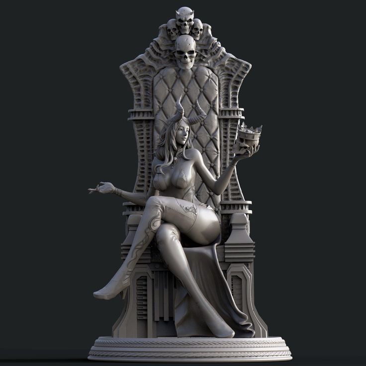 a statue of a woman sitting on top of a chair with a cat in her lap