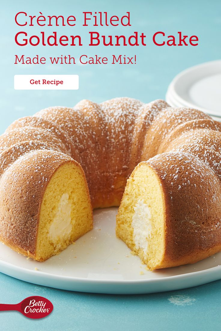 a cake that has been cut in half and is on a plate with the words creme filled golden bundt cake made with cake mix