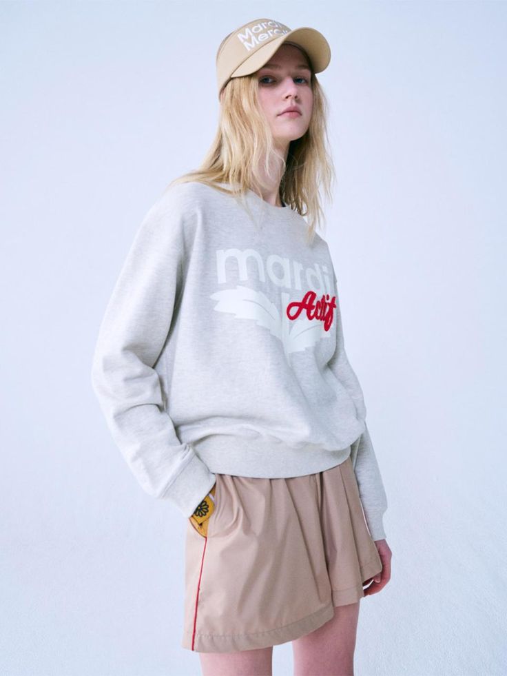 This is a trendy and sporty sweatshirt by Mardi Mercredi Actif that is made out of high quality and sturdy material. With distinctive mood of the design and comfortable wear, you can style it for your casual activewear outfit.- Actif logo embroidery and Bloommardi print- Round ribbed neckline, cuffs, and hem- Sporty and unique mood Trendy Crew Neck Hoodie With Embroidered Logo, Fall Logo Print Sporty Sweatshirt, Sporty Logo Print Sweatshirt For Fall, Fall Sporty Sweatshirt With Logo Print, Athleisure Crew Sweatshirt With Embroidered Logo, Sporty Tops With Embroidered Logo In French Terry, Varsity Cotton Sweatshirt With Logo Print, Sporty Crew Sweatshirt With Embroidered Logo, Cotton Varsity Sweatshirt With Logo Print