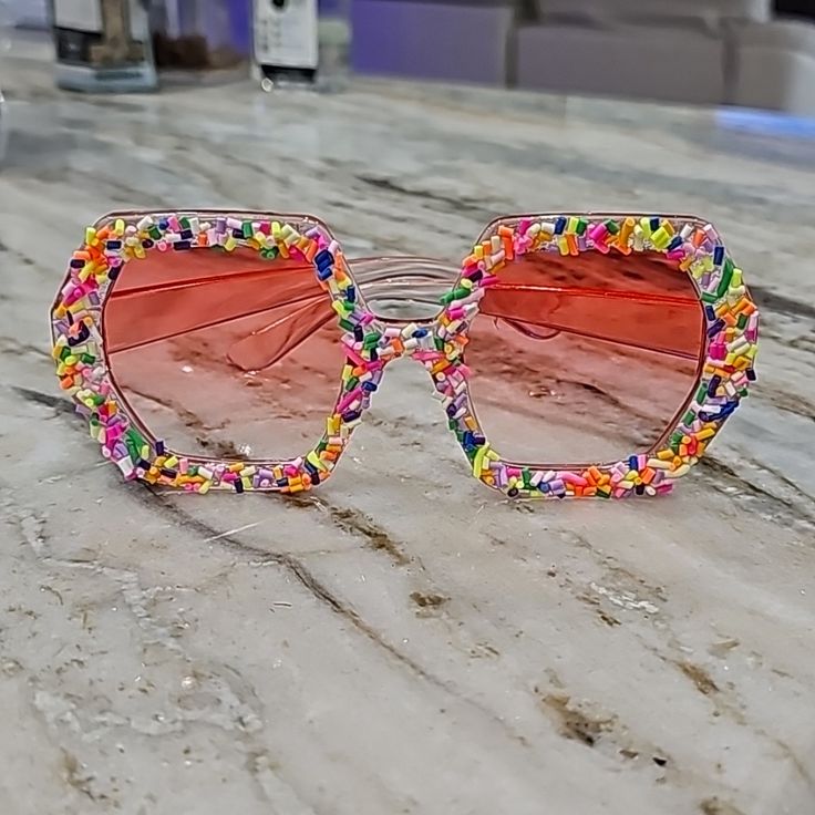 Fun Fashion Sprinkle-Like Sunglasses. Summer Beach Sunglasses With Glass Material, Summer Beach Sunglasses With Glass Lenses, Pink Glass Sunglasses For The Beach, Pink Glass Sunglasses For Beach, Multicolor Polarized Sunglasses For Summer, Summer Beach Shield Sunglasses With Glass Lenses, Multicolor Uv Protection Summer Sunglasses, Summer Beach Shield Sunglasses With Glass, Summer Multicolor Tinted Sunglasses