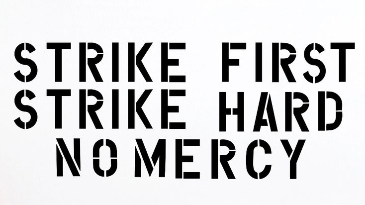 a black and white sign that says strike first strike hard no mercy