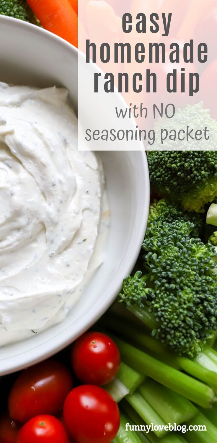 an easy homemade ranch dip with no seasoning in a bowl surrounded by fresh vegetables