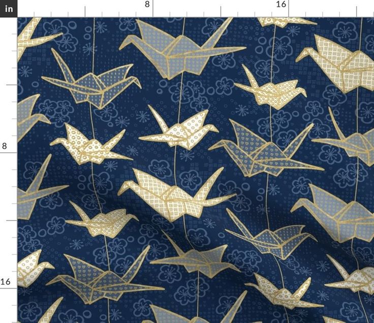 a blue and gold fabric with birds on it