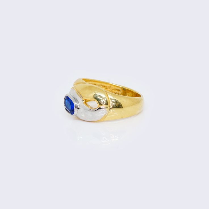 Experience the ultimate in luxury and sophistication with our 14K YELLOW & WHITE GOLD OVAL BLUE ring. Crafted with premium quality materials, this ring features a stunning oval blue gemstone set in a unique two-tone gold band. Elevate your style and make a statement of exclusivity with this exquisite piece. Details: Metal: 14K Gold Item #: MENR1-28 Blue Oval Enamel Rings, Blue Turquoise 14k Gold Oval Cabochon Ring, Luxury Yellow Gold Turquoise Ring, Oval Cabochon, Luxury Turquoise Gemstone Ring, Oval Cabochon, Oval Blue Multi-stone Gemstones, Yellow Stone, Pearl Strands, White Gold Band, Blue Gemstones