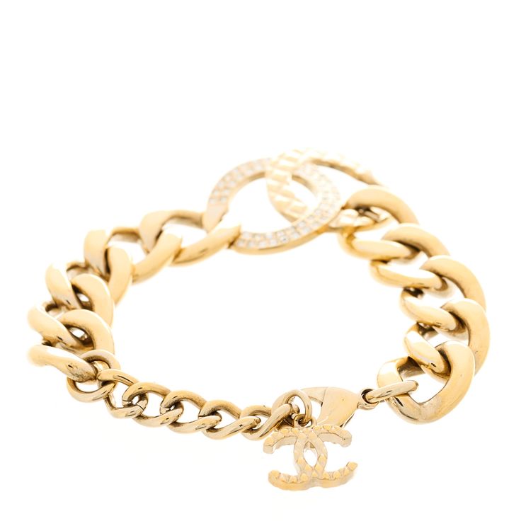 This is an authentic CHANEL Crystal CC Link Chain Bracelet in Gold. This stylish bracelet features a gold chain with a crystal encrusted CC logo. Gold Chanel, Link Chain Bracelet, Stylish Bracelet, Chanel Jewelry, Gold Bracelet Chain, Cc Logo, Bracelet Gold, Chains Jewelry, Link Chain