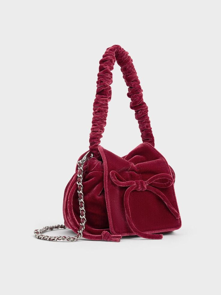 If you are looking to add a pop of colour to your look, this elegant pink top-handle bag is a sensible choice. It features a simple, classic pouch silhouette that allows the design details -- including the ruched handle and dainty bow embellishment -- to shine. Carry it by hand for a polished look or tuck it under the arm for hands-free convenience. You can always count on the velvety soft finish to complete your look with sophistication. Belt Ring, Ruched Top, Charles Keith, Velvet Bow, Kids Sale, Pink Top, Pink Velvet, To Shine, Handle Bag