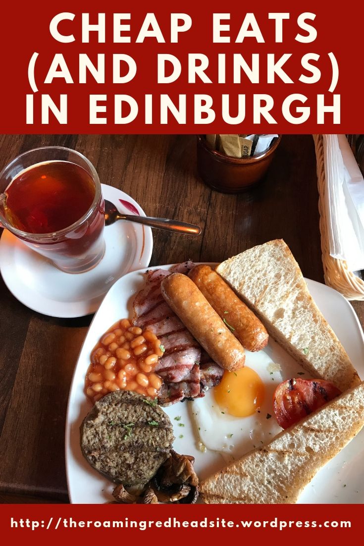 an english breakfast with eggs, bacon, beans and toast on a white plate next to a cup of tea