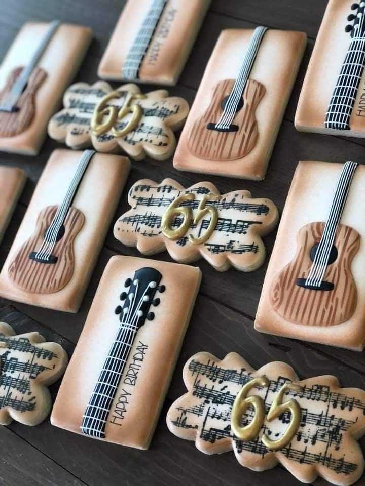 decorated cookies with musical instruments on them