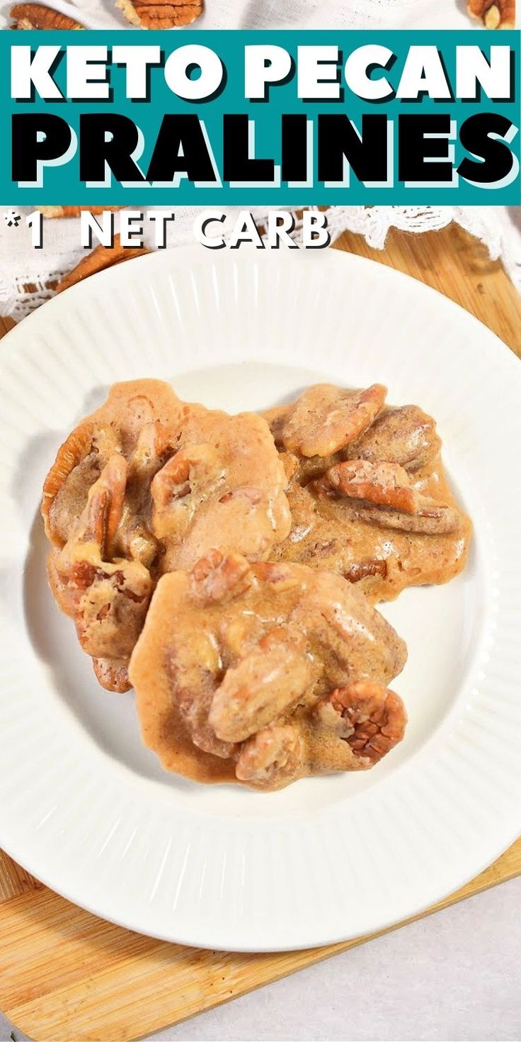 a white plate topped with meat covered in gravy on top of a wooden cutting board