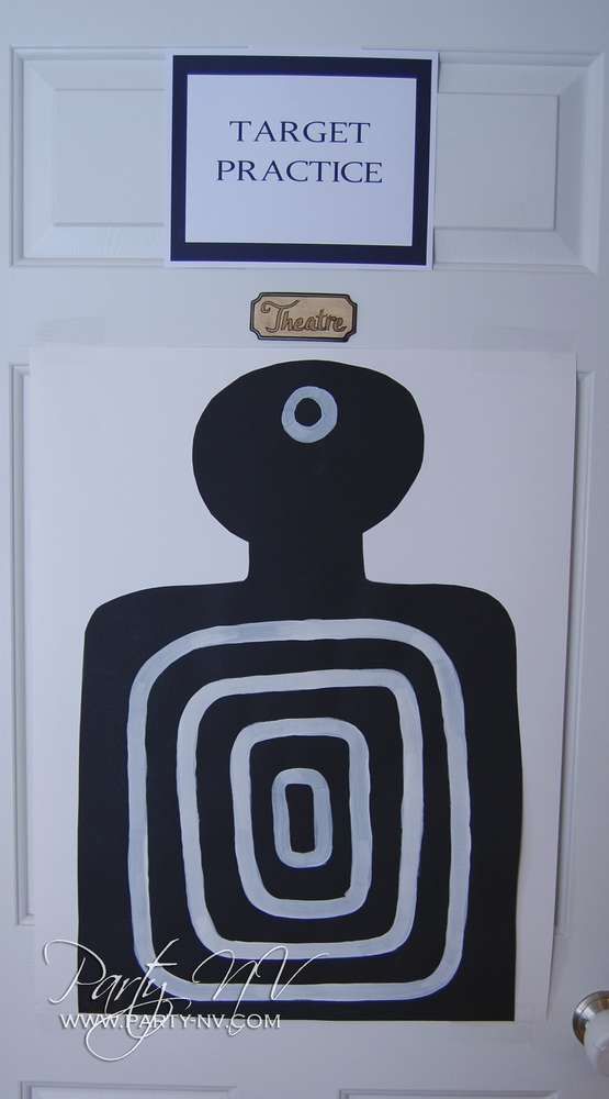 a door with a black and white painting on it that says target practice in the center