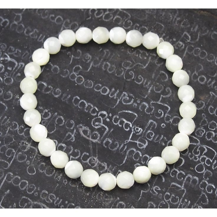 Mother of Pearl Stretch Bracelet Size Approx. 6 1/4" Bead Size : 6mm Hand-crafted at Beads of Paradise NYC Pearl White Crystal Bracelet With Round Beads, Healing Pearl Bracelet With 8mm Round Beads, Hand-strung Pearl White Beaded Bracelets, White Pearl Bracelet With 8mm Round Beads, Pearl White Stretch Bracelet With Round Beads, Hypoallergenic Rosary Bracelet With Round Beads, Spiritual Beaded Pearl Bracelet, Hand-strung White Pearl Bracelet With Round Beads, White Hand-strung Pearl Bracelet With Round Beads