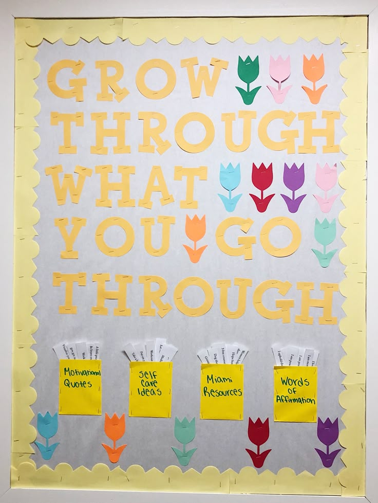 a bulletin board with flowers and words written on it that says grow through what you go through