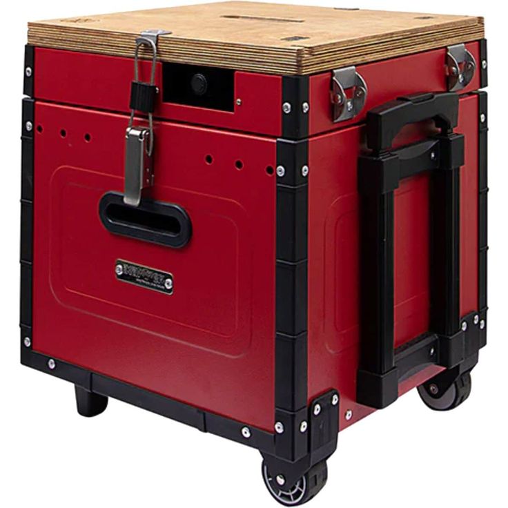 a red and black box on wheels with wood top in the shape of a trunk