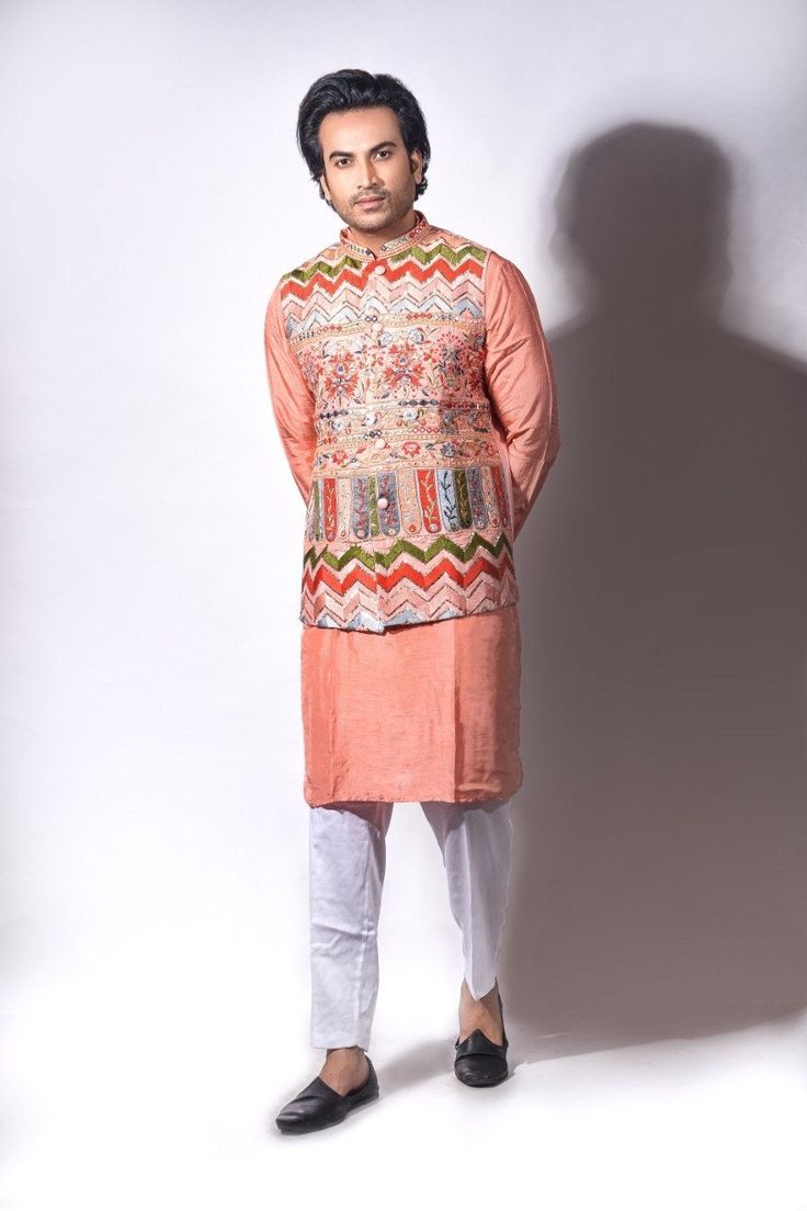 Kurta pajama jacket set beautifully embroidered silk jacket paired with silk kurta pajama Spring Designer Raw Silk Nehru Jacket, Designer Chikankari Embroidery Sherwani For Spring, Cotton Sherwani With Dabka Work For Spring, Spring Sherwani With Resham Embroidery, Straight Kurta Style, Spring Luxury Sherwani With Chikankari Embroidery, Bollywood Sherwani With Zari Work For Spring, Unstitched Cotton Nehru Jacket For Spring, Traditional Raw Silk Nehru Jacket For Spring, Bollywood Style Floral Embroidered Chanderi Nehru Jacket