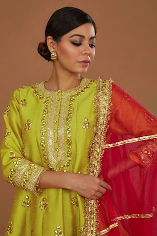 Lime yellow dupion short anarkali with gota embroidery. Comes with churidar and a fuchsia organza dupatta. - Aza Fashions Yellow Slub Silk Salwar Kameez With Dori Work, Gold Slub Silk Churidar For Designer Wear, Designer Gold Slub Silk Churidar, Designer Wear Gold Slub Silk Churidar, Pista Green Tissue Silk Kurta For Diwali, Yellow Tissue Silk Kurta For Diwali, Pista Green Slub Silk Churidar For Festivals, Yellow Slub Silk Churidar For Festivals, Pista Green Kundan Anarkali Set For Navratri