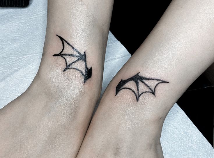 two tattooed batwings on each wrist Bat Tattoo Wrist, Batwing Tattoos, Bat Wrist Tattoo, Bat Tattoo, Wing Tattoo, Wing Collar, Collar Bone Tattoo, Wrist Tattoo, Wings Tattoo