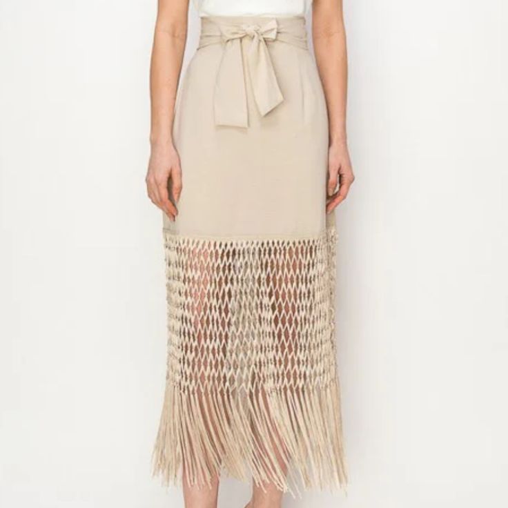 Stunning Fringe Hem High Waist Skirt - This Skirt Boasts A Unique Fringed Hem And High Waist Design, Accentuated By A Chic Belt. Elevate Your Style With This Fashionable Piece Today! Beige Midi Skirt For Day Out, Beige Pencil Skirt For Day Out, Beige Midi Skirt For Party, Elegant Long Skirt With Fringe, Party Beige Midi Skirt, Beige Pencil Skirt For Summer, Elegant Mini Skirt For Beach Spring Season, Elegant Mini Skirt For Beach In Spring, Spring Party Beige Maxi Skirt