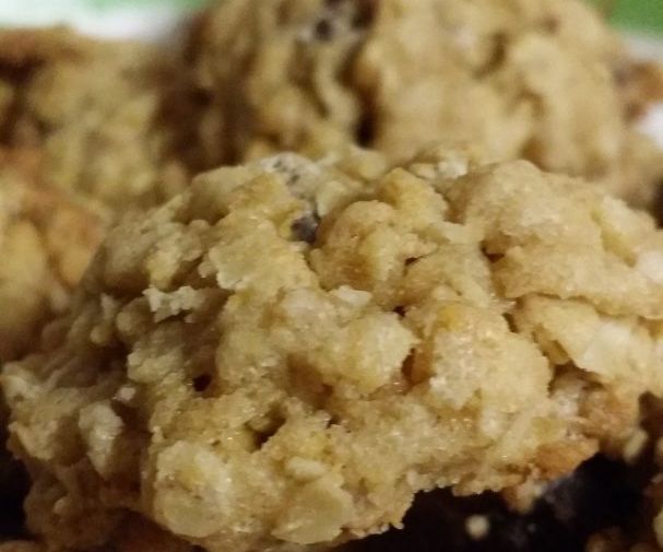 some cookies are stacked on top of each other with crumbs all over them