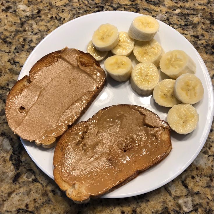 peanut butter and banana slices on a plate